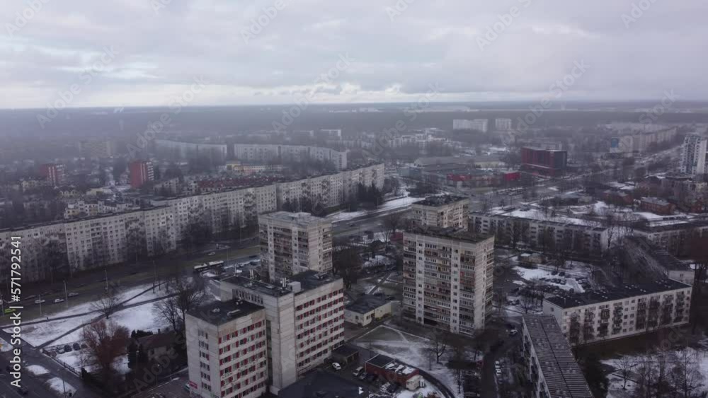 Industrial cityscape in the snow-covered European city of Riga. Aerial drone view. Industrial cityscape in the snow-covered European city of Riga. Aerial drone view.