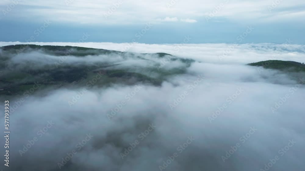 Aerial shot overhead low-lying clouds in the Tatras Mountains, Slovakia Aerial shot overhead low-lying clouds in the Tatras Mountains, Slovakia