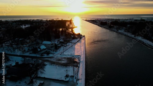 Sun rising over Lake Michigan. Gorgeous colors across frozen lakes and ice cover. photo