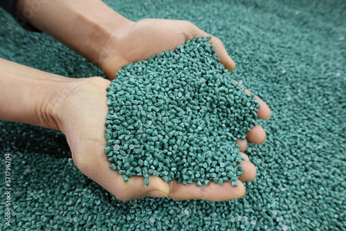 Plastic pellets for production,plastic polymer dye granules color green.	