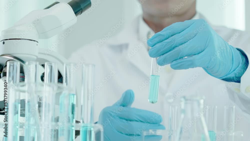 scientist analyze biochemical samples in advanced scientific laboratory. Medical professional use dropper mix microbiological developmental of viral. Biotechnology research in science lab. cosmetic scientist analyze biochemical samples in advanced scientific laboratory. Medical professional use dropper mix microbiological developmental of viral. Biotechnology research in science lab. cosmetic
