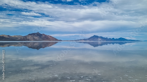 Panoramic view of beautiful mountain reflecting in lake of Bonneville Salt Flats  Wendover  Western Utah  USA  America. Looking at summits of Silver Island Mountains range. West of Great Salt Lake