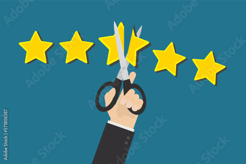 Dissatisfied customer uses scissors and cuts off rating stars. Down rating, concept. Negative review. Testimonials, bad client feedback. Stars rating, grading system. Clients rank.