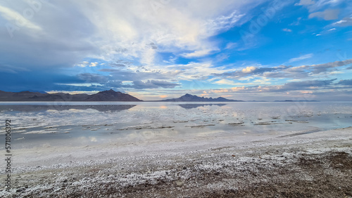 Scenic view of beautiful mountains reflecting in lake of Bonneville Salt Flats at sunset  Wendover  Western Utah  USA  America. Looking at summits of Silver Island Mountain range. Romantic atmosphere