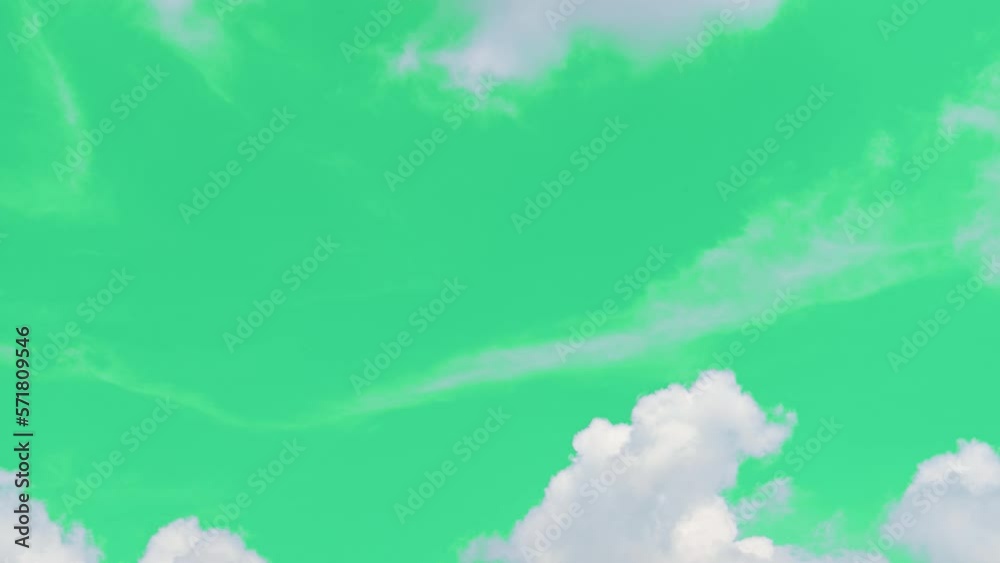 The green screen of moving white clouds with 4K resolution. Can use to change the background color.	
