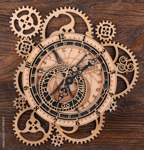 wooden infinity clock on wooden background