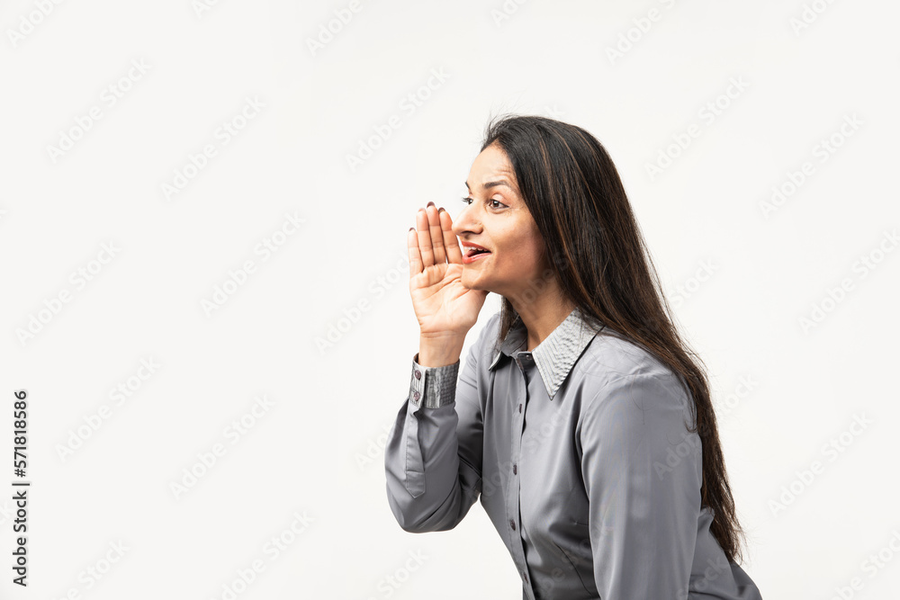 Indian woman hand on mouth telling secret rumor, whispering malicious talk conversation Indian woman hand on mouth telling secret rumor, whispering malicious talk conversation