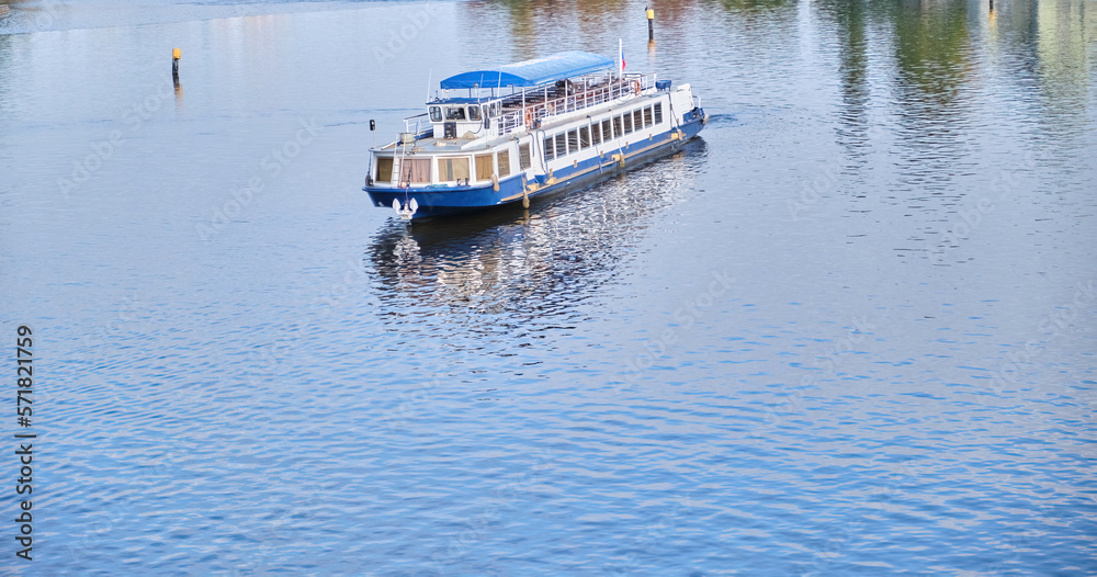 blue and white river cruise boat navigation romantic city journey
