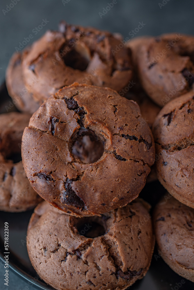 Fototapeta premium sweet home made chocolate chip donuts on a table