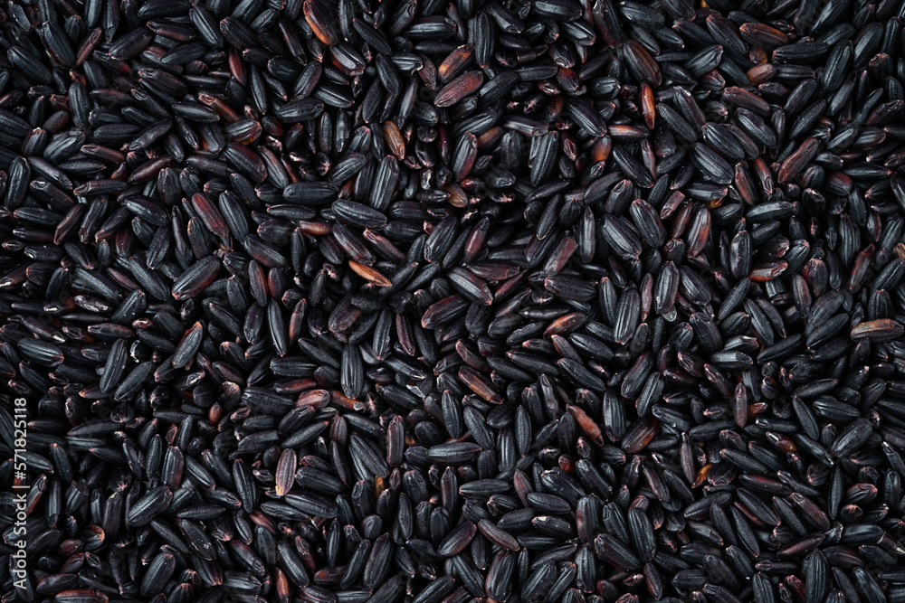 Whole grain black rice texture. Top view, close up Whole grain black rice texture. Top view, close up