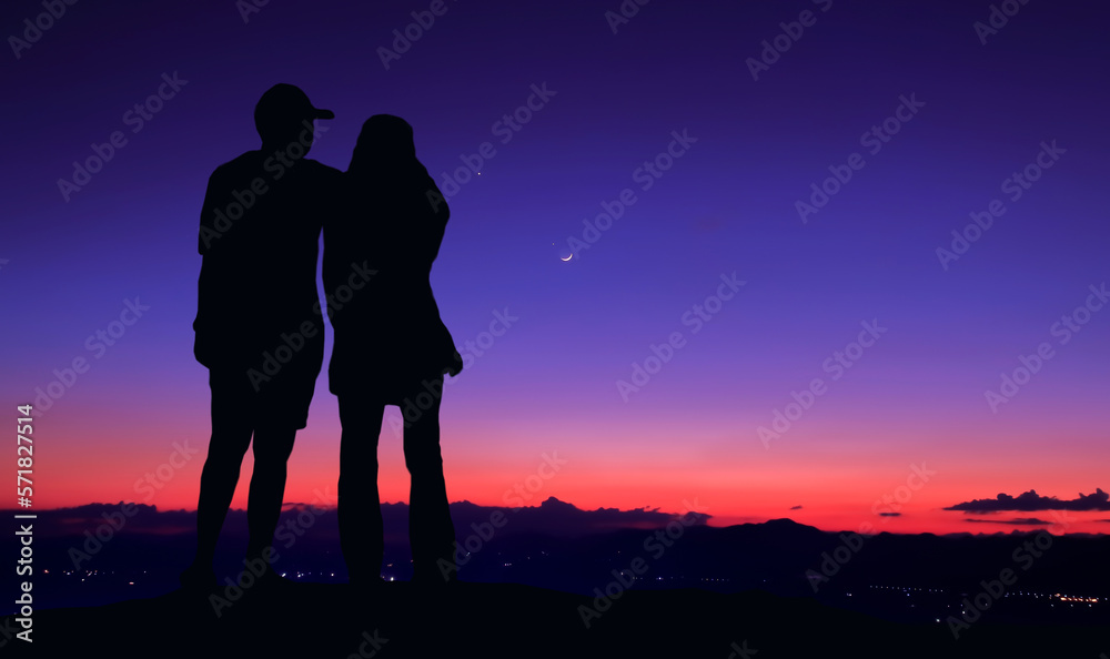 Silhouette couple with the beauty of nature at dusk