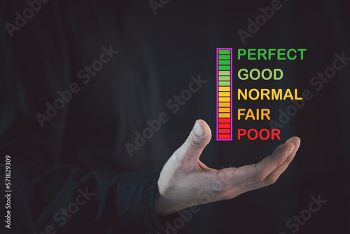 Businessman pointing a five stars icon to assess satisfaction with product and services on a virtual screen, Customer satisfaction and service quality survey, highest level, positive feedback. 