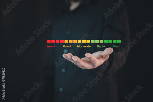 Businessman pointing a five stars icon to assess satisfaction with product and services on a virtual screen, Customer satisfaction and service quality survey, highest level, positive feedback. 