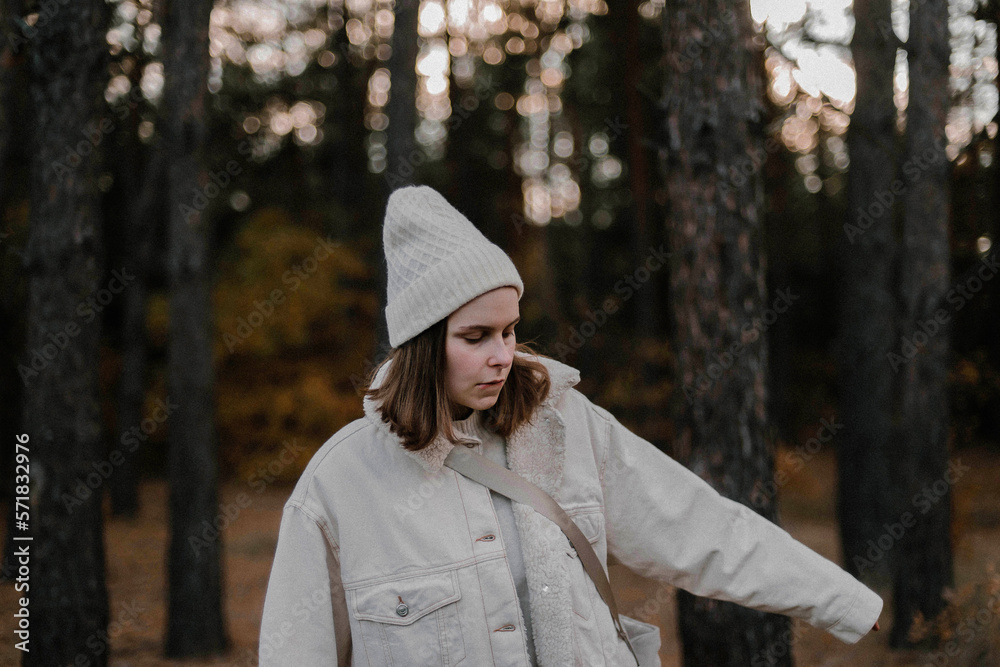 Portrait of young woman on trees background at forest Portrait of young woman on trees background at forest