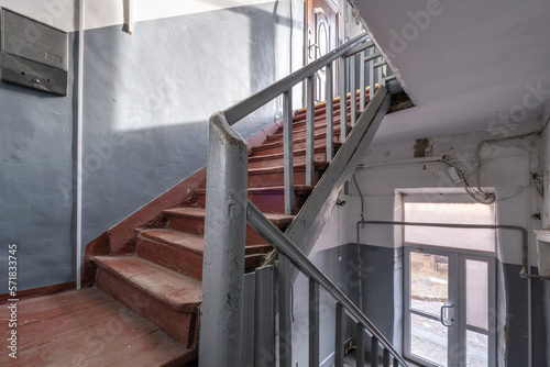 stairs emergency and evacuation exit in up ladder in old house or building