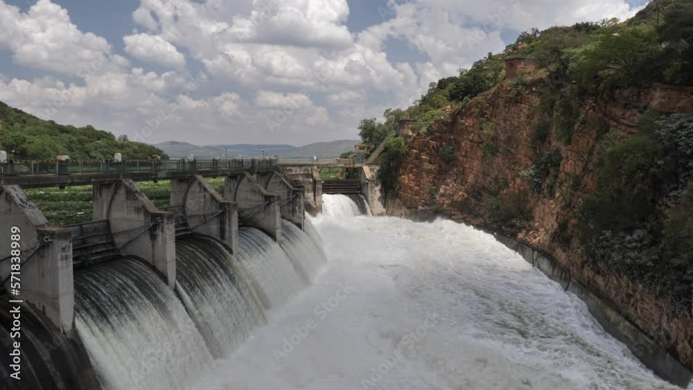 Spring floodwater is released from gates on hydro power dam in Africa Spring floodwater is released from gates on hydro power dam in Africa