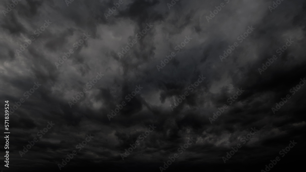 dark dramatic sky with stormy clouds before rain or snow as abstract background, extreme weather