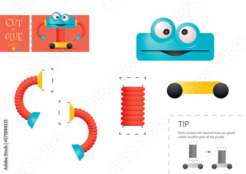 Cut and glue paper vector toy. Funny robotic character as a cardboard cutout model