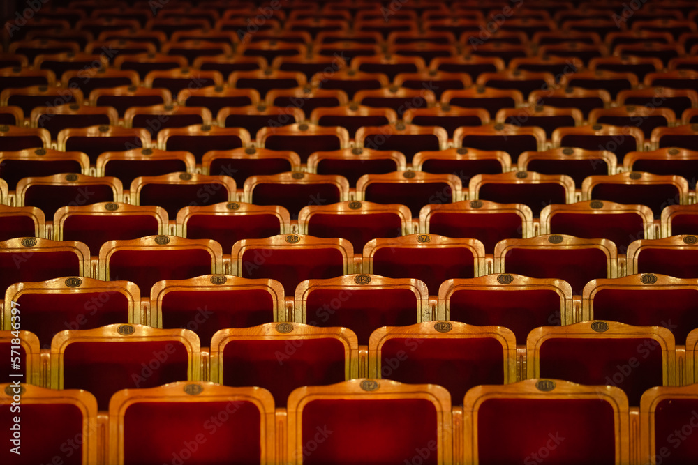 Fototapeta premium Row of red seats in theatre