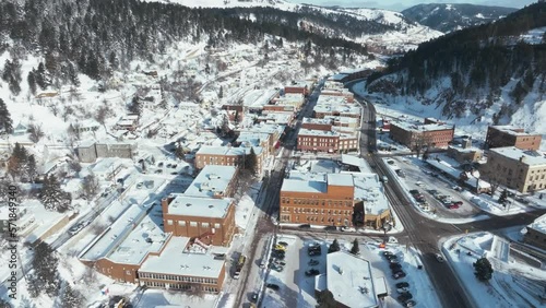 Flying over Main Street in Deadwood, South Dakota during winter