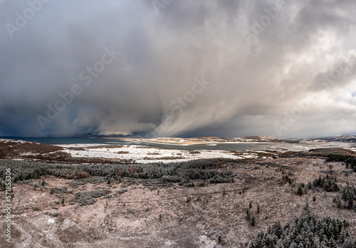 Dramatic Thunder cloud coming into Gweebarra bay by Portnoo in County Donegal, Ireland. photo