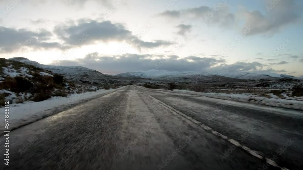 The road from Church Hill towards Dunlewey with the Muckish mountain and Errigal in the background , County Donegal. Republic of Ireland The road from Church Hill towards Dunlewey with the Muckish mountain and Errigal in the background , County Donegal. Republic of Ireland