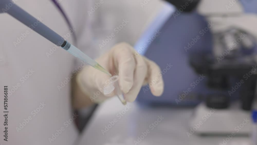Medical Research Laboratory: Portrait of a Beautiful Female Scientist in Goggles Using Micro Pipette for Test Analysis. Advanced Scientific Lab for Medicine, Biotechnology, Microbiology Development