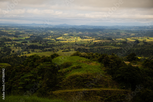 Lush Hilly view over a Valley With clouds rolling over