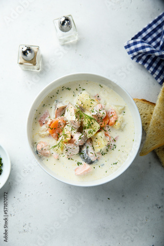 Traditional fish soup with vegetables and cream