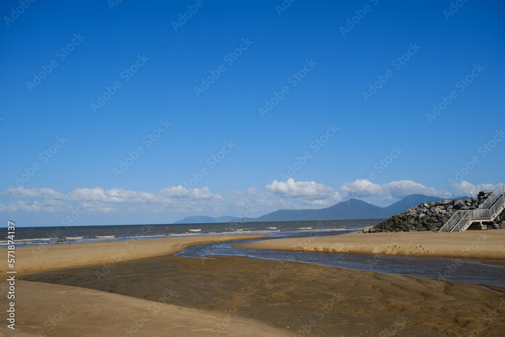 Beautiful Beach view with clouds, rocks and in the jungle 