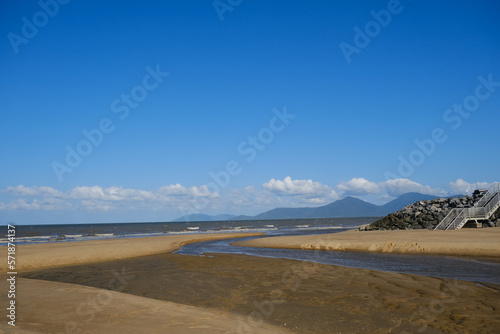 Beautiful Beach view with clouds, rocks and in the jungle 