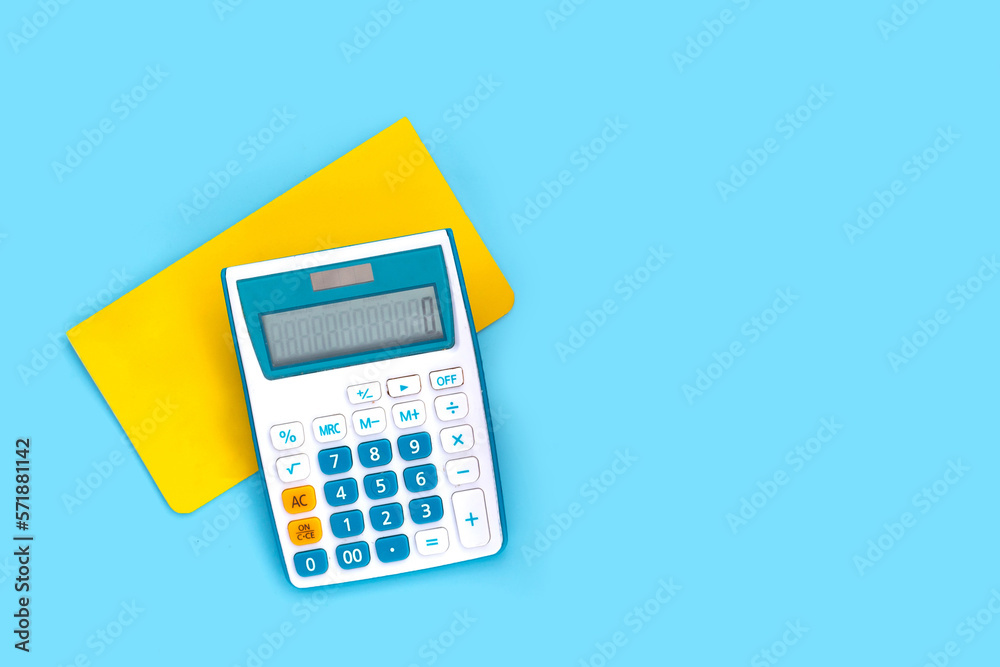 Calculator with bank book on blue background. Calculator with bank book on blue background.