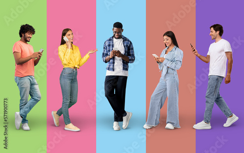 Digital Communication. Young Happy Multiethnic People Using Mobile Phones Over Colorful Backgrounds