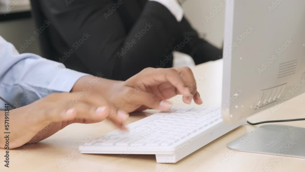 Hands of businessperson typing keyboard of computer at office for online communication with customer. Hands of businessperson typing keyboard of computer at office for online communication with customer.