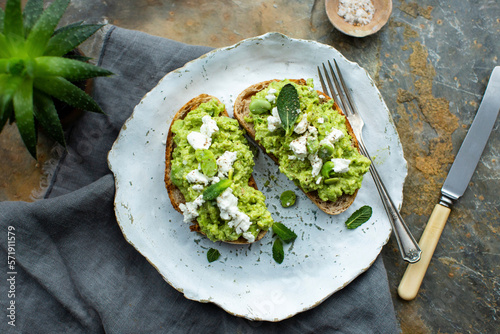 Soda bread with bean hummus and feta cheese photo