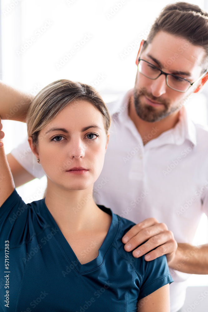 A Modern rehabilitation physiotherapy man at work with woman client A Modern rehabilitation physiotherapy man at work with woman client