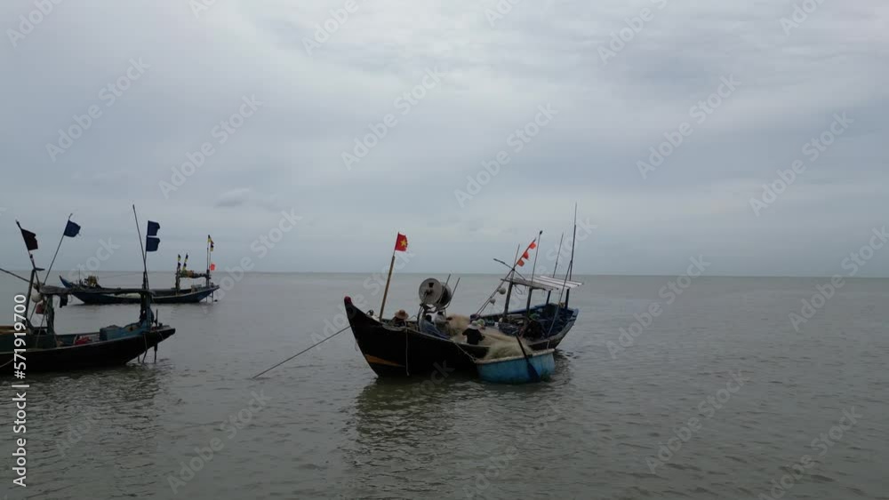 A boat with many fishermen fishing near the coast of Vietnam, original color A boat with many fishermen fishing near the coast of Vietnam, original color