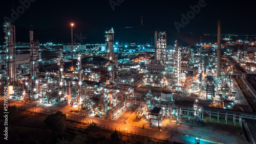 industrial area production plant or refinery crude oil and gas for transportatioon and export, aerial photography at night scene from drone, © SHUTTER DIN