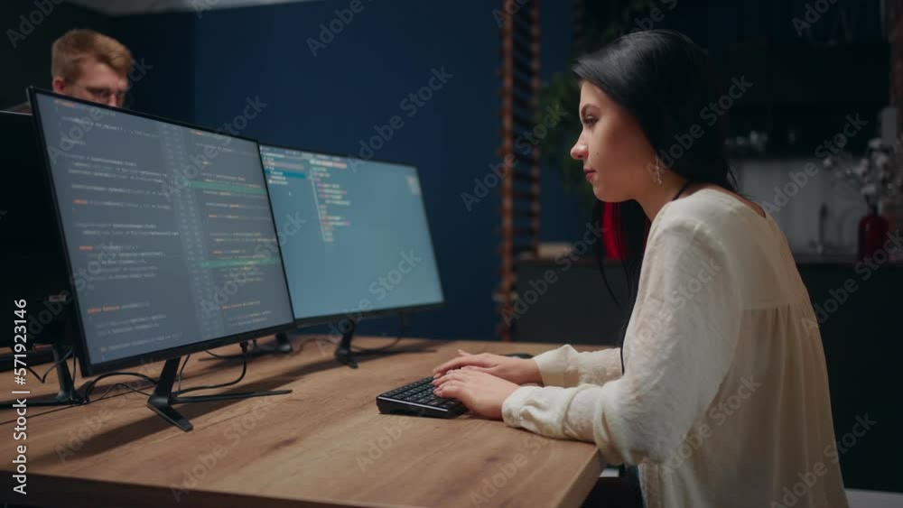 woman programmer writing code on computer, middle data analyst working in office of IT-company