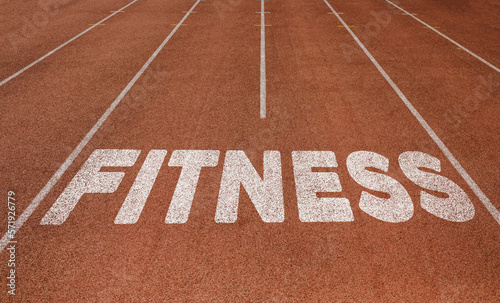 Fitness written on running track, New Concept on running track text in white color