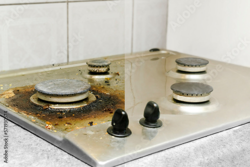 Collage of cleaning dirty and clean gas stove from grease, food leftovers bits of food before - after washing.kitchen stove. House home domestic cleaning service concept,chores,housework