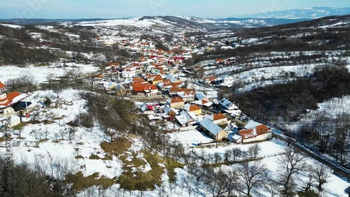 Silvasu de Sus village, Hateg, Romania, Europe. Drone footage. photo