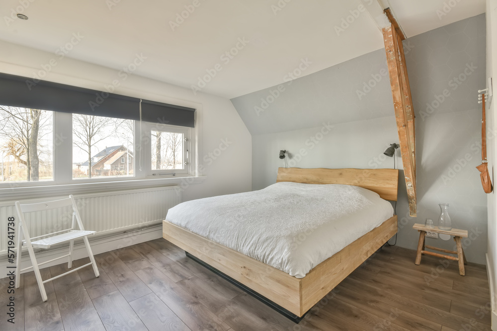 White bedroom interior with comfortable bed White bedroom interior with comfortable bed