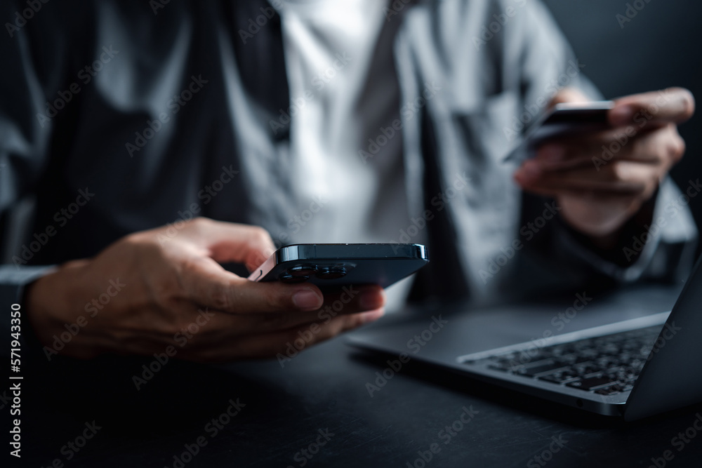 Shopping online payment E-commerce concept. Man hand using smart phone, banking and online shopping via mobile banking app, E-transaction and financial technology Shopping online payment E-commerce concept. Man hand using smart phone, banking and online shopping via mobile banking app, E-transaction and financial technology