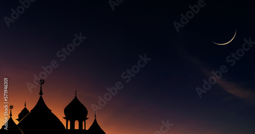 Mosques dome and crescent moon on dusk sky twilight religion of Islamic and free space for text Ramadan Kareem  Eid al Fitr  Eid Mubarak  Eid al Adha  Muharram 