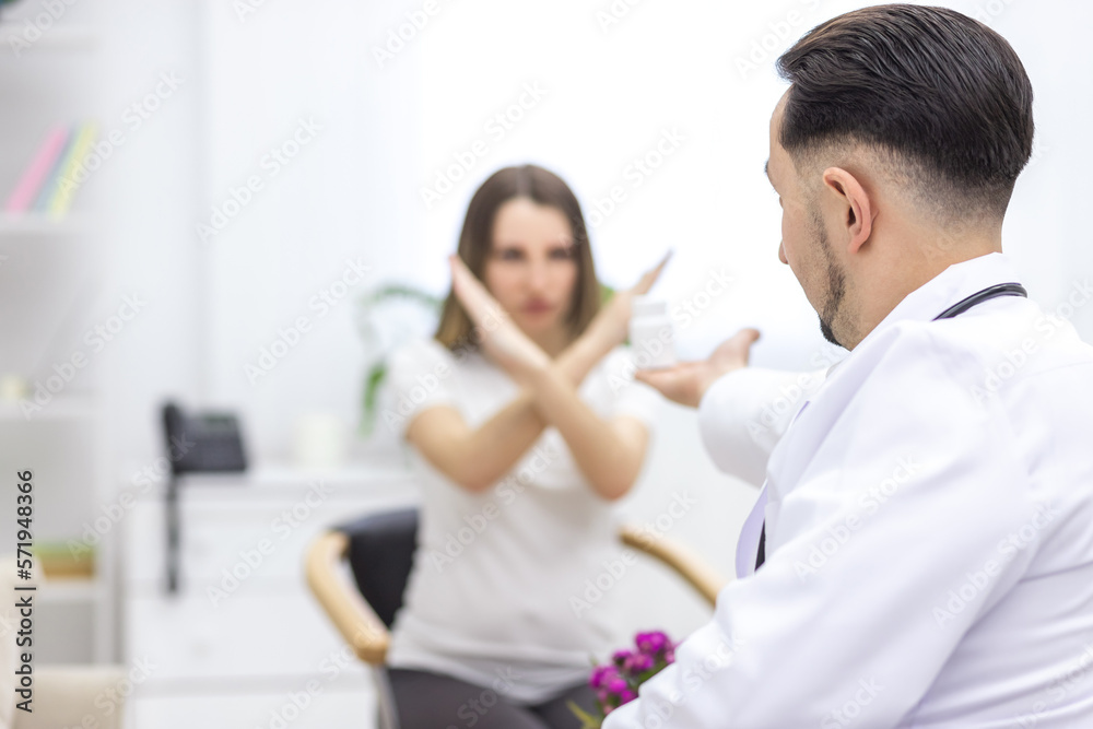 Photo of pregnant woman speaking with a doctor. Photo of pregnant woman speaking with a doctor.