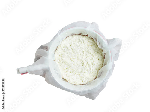 Fresh ricotta cheese in a white sieve on a white background, cottage cheese in a sieve on a white background, soft ricotta cheese, the process of making cottage cheese, the process of making homemade 