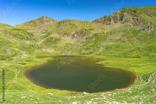 Lakes of Astun hike and views of the valley in Aragon pyrenees mountains in summer in a suuny day photo