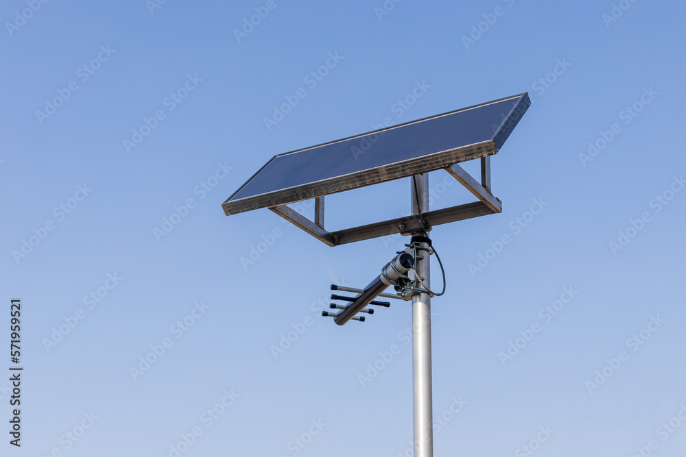 Antenna with a solar panel for water level monitoring transmission