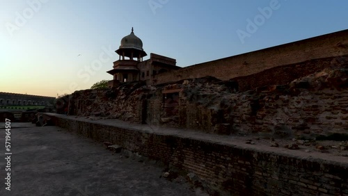 Walking near the Akbari  Mahal taking video of it minaret at Agra Fort, Agra photo